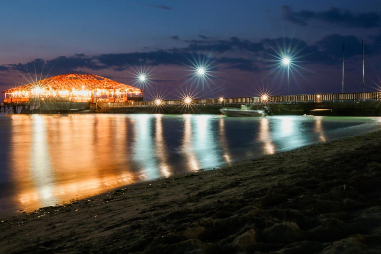 Klajdi Resort Golem  Esterno foto The port of Koper at night