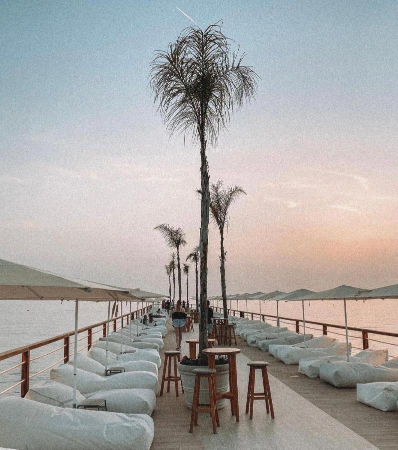 Klajdi Resort Golem  Esterno foto Sunset at the beach